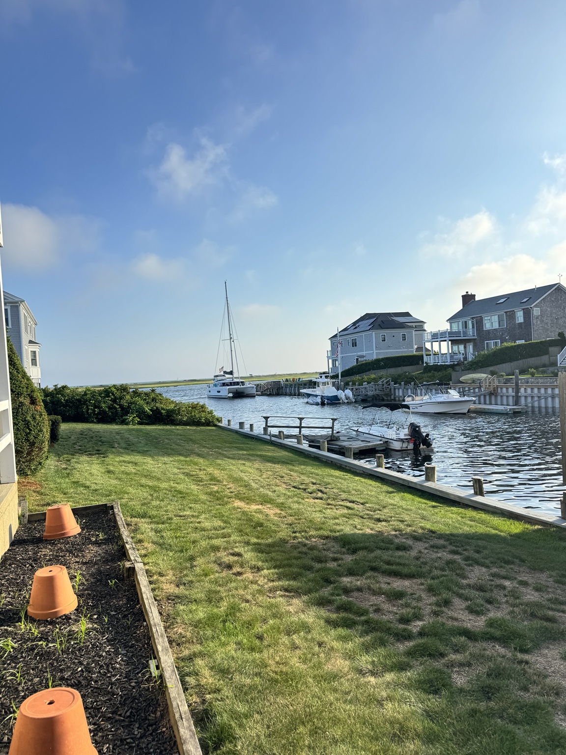 Freshly maintained waterfront lawn on Cape Cod